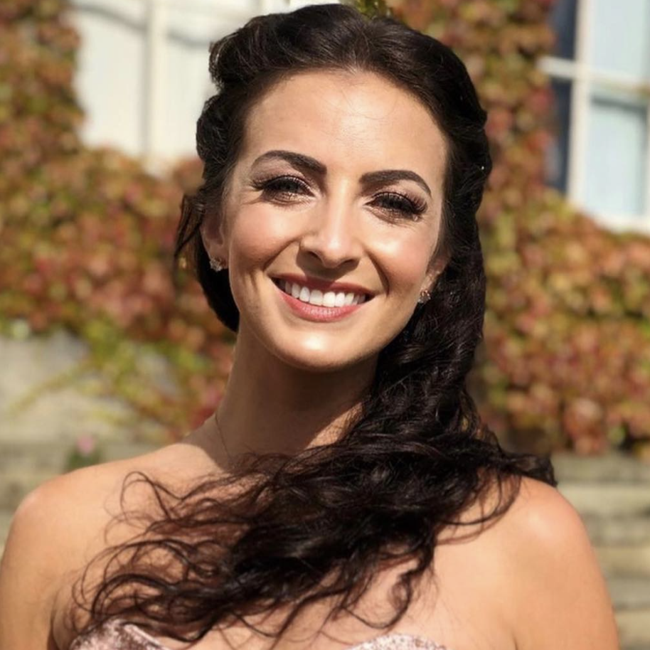 A smiling Invisalign patient of Dr Eassun